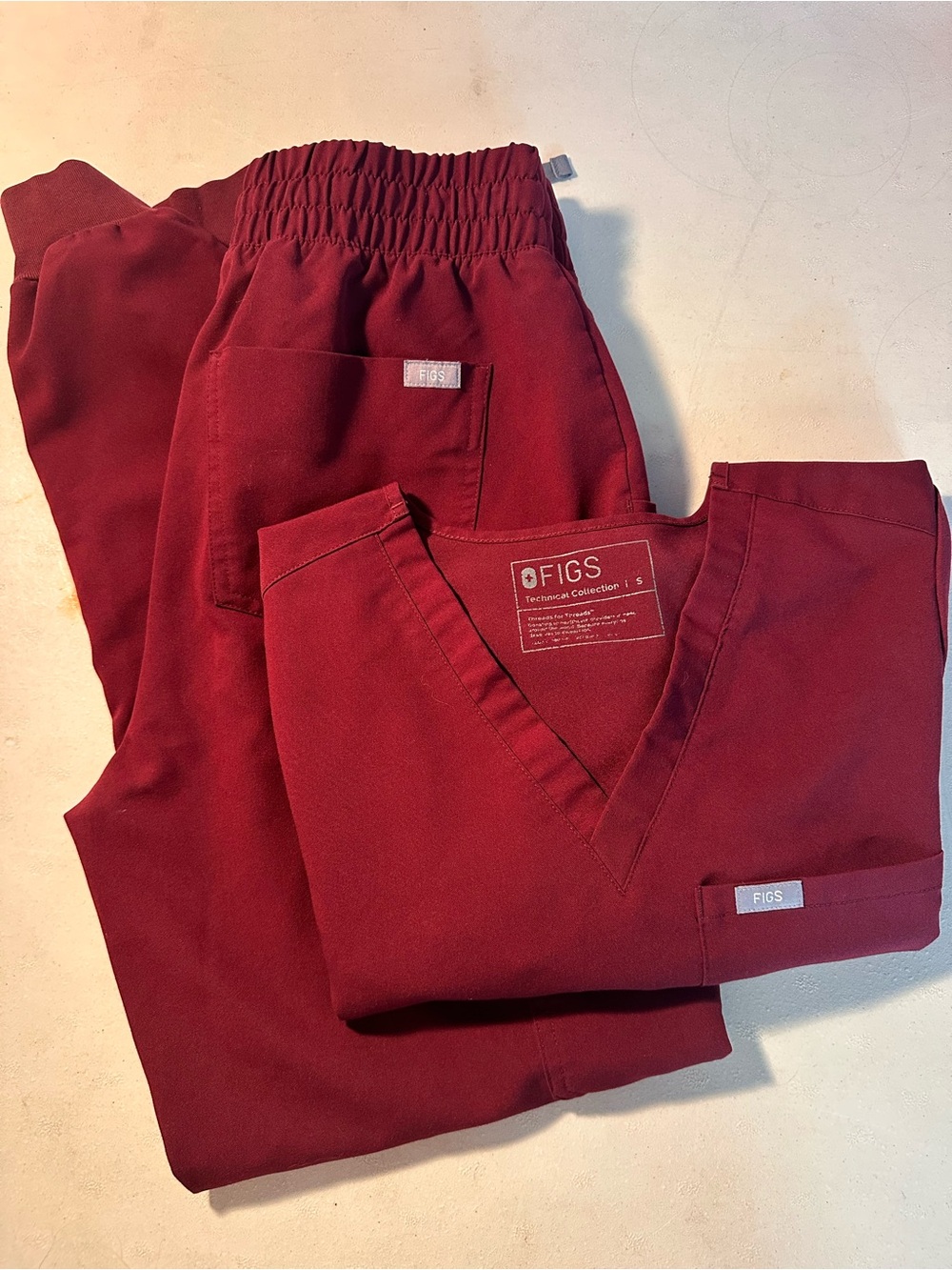 FIGS Women’s Burgundy Technical Collection Scrub Set
